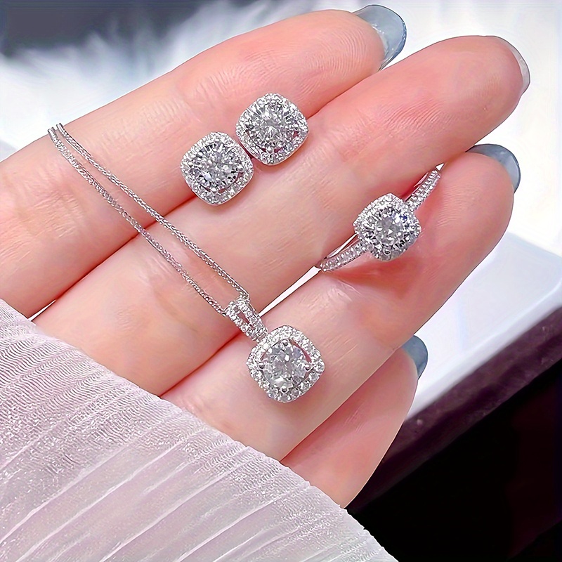 Elegant 4pcs Commemorative Shining Earrings Pendant Necklace Ring Set